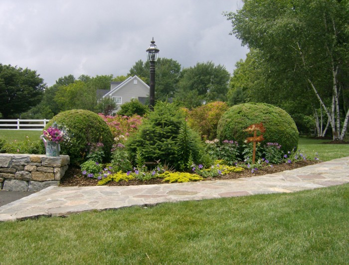 Entrance garden connecting driveway to house.